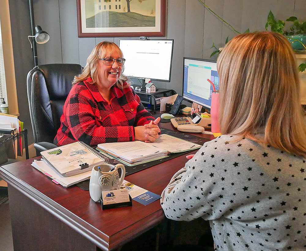 Chris counseling with client.