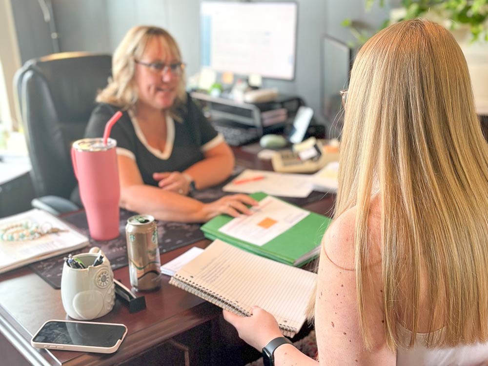 Chris counseling with client.