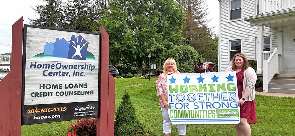Chris and Jami with sign.