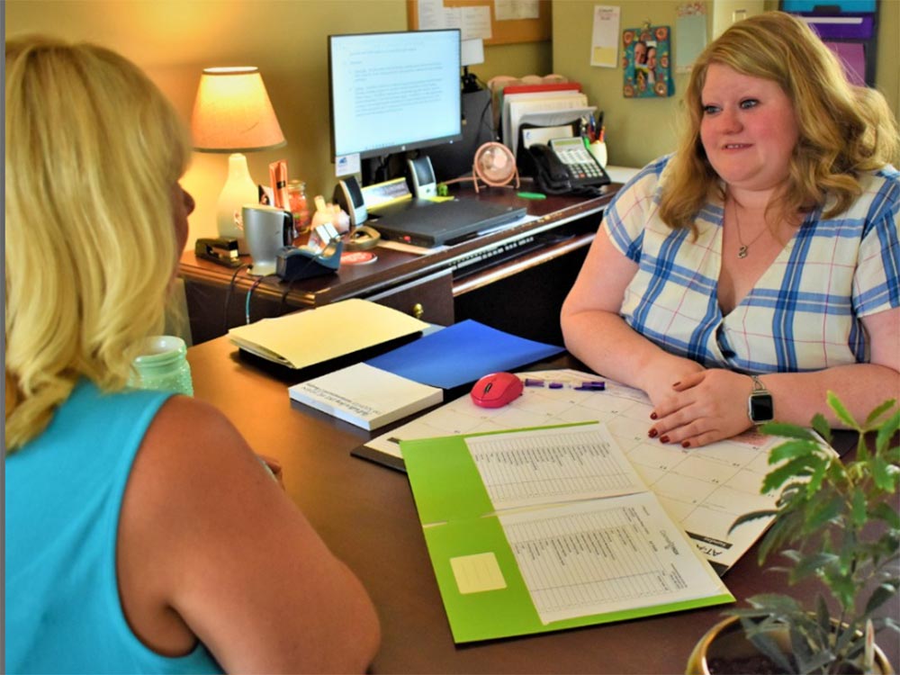 Jami counseling with clients.